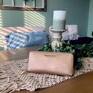 Authentic Micheal Kors large shimmer Gold Wallet.